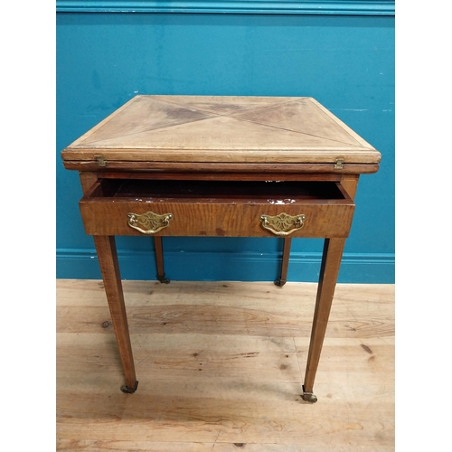 221 - 19th C. mahogany envelope card table with single drawer in frieze raised on tapered legs with caster... 