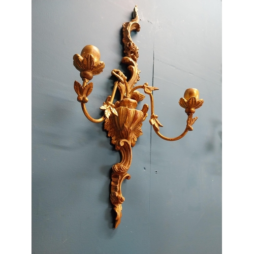 226 - Pair of giltwood wall lights in the Rococo manner. {64 cm H x 32 cm W x 17 cm W}.