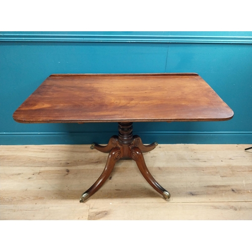 227 - 19th C. mahogany side table on four outswept feet. {74 cm H x 121 cm W x 64 cm C}.