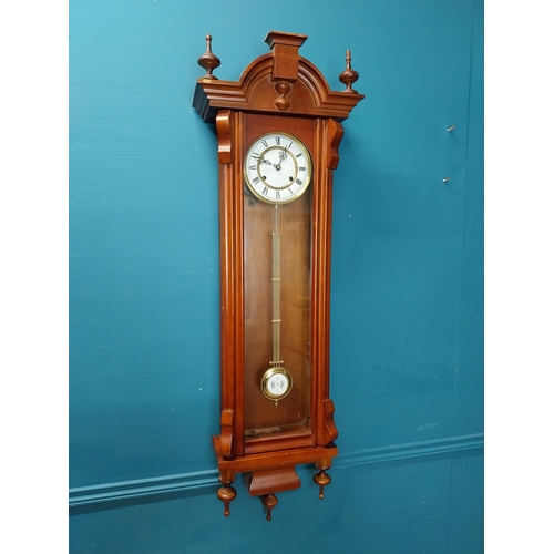 233 - Mahogany Vienna wall clock in the Victorian style with metal and ceramic pendulum. {128 cm H x 41 cm... 