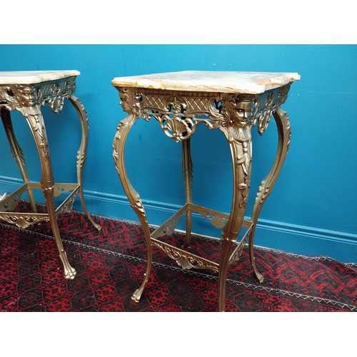 235 - Pair of brass lamp tables with Onyx tops in the Rocco style {80 cm H x 41 cm W x 41 cm D}.