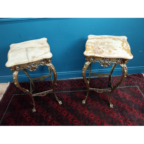 235 - Pair of brass lamp tables with Onyx tops in the Rocco style {80 cm H x 41 cm W x 41 cm D}.