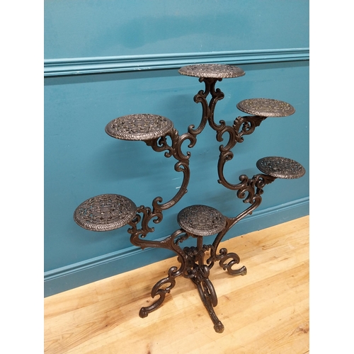 239 - Decorative cast iron plant stand. {101 cm H x 92 cm W x 50 cm D}.