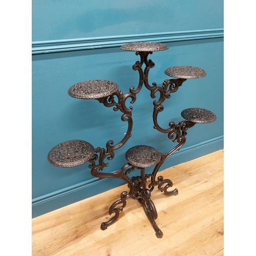 239 - Decorative cast iron plant stand. {101 cm H x 92 cm W x 50 cm D}.