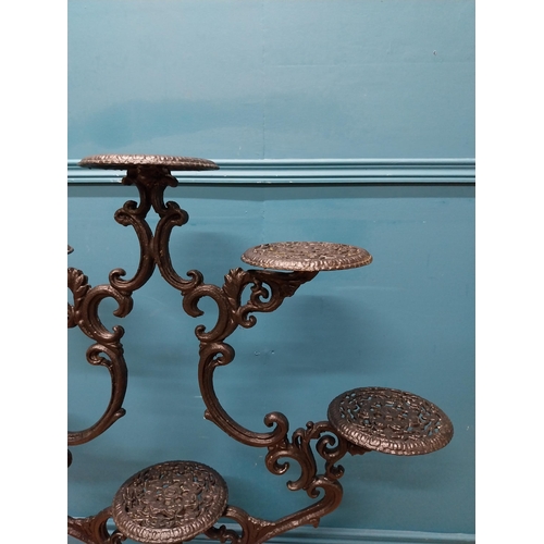 239 - Decorative cast iron plant stand. {101 cm H x 92 cm W x 50 cm D}.