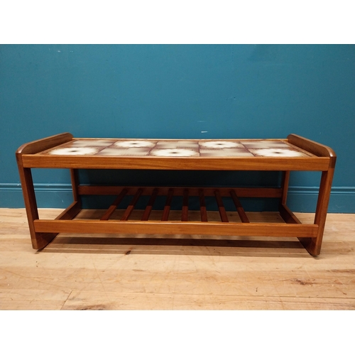 240 - Retro teak coffee table with inset tiled top. {43 cm H x 115 cm W x 45 cm D}.