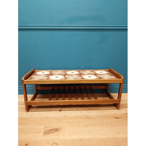 240 - Retro teak coffee table with inset tiled top. {43 cm H x 115 cm W x 45 cm D}.