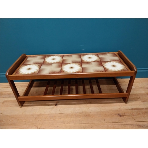 240 - Retro teak coffee table with inset tiled top. {43 cm H x 115 cm W x 45 cm D}.