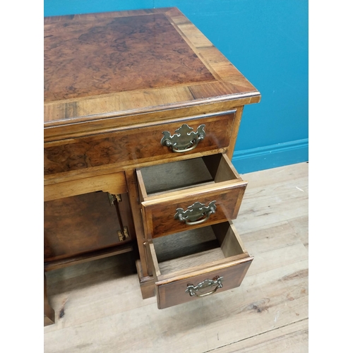 241 - Burr walnut lowboy in the Georgian style with single long drawer in frieze and eight short drawers w... 