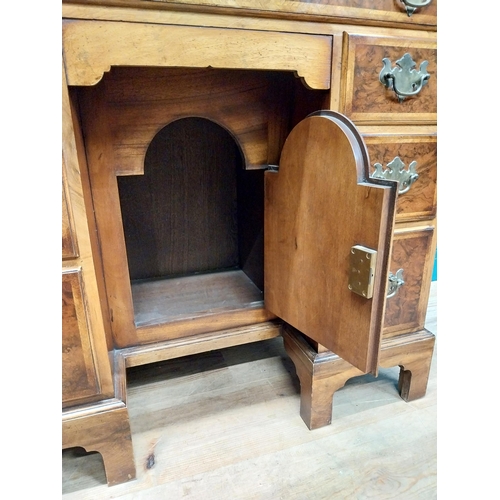 241 - Burr walnut lowboy in the Georgian style with single long drawer in frieze and eight short drawers w... 