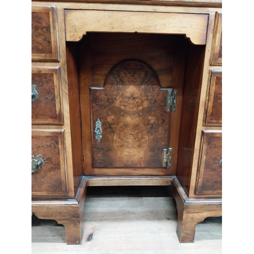 241 - Burr walnut lowboy in the Georgian style with single long drawer in frieze and eight short drawers w... 