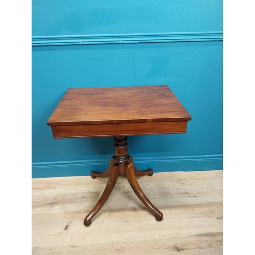 247 - 19th C. mahogany occasional table  on turned column with four outswept feet. {74 cm H x 61 cm W x 45... 