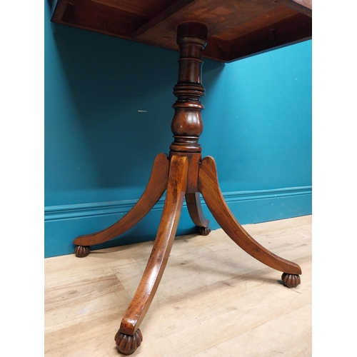 247 - 19th C. mahogany occasional table  on turned column with four outswept feet. {74 cm H x 61 cm W x 45... 