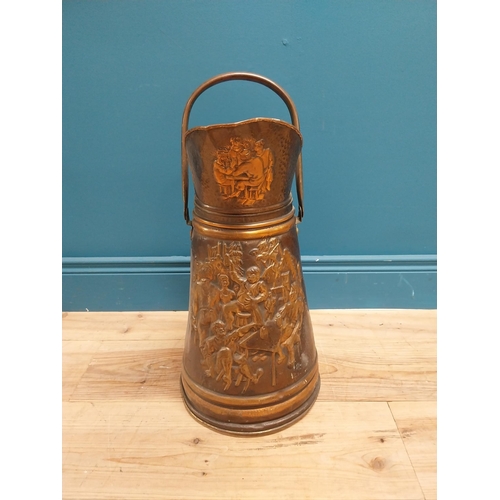 248 - 1950's hand beaten copper coal helmet. {55 cm H x 28 cm Dia.}.