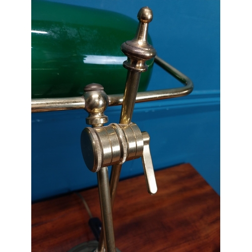 25 - Good quality brass banker's lamp with green glass shade. {49 cm H x 26 cm W x 32 cm W}.