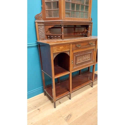 250 - Edwardian mahogany and satinwood inlaid chiffonier with single glazed door above long drawer and pan... 