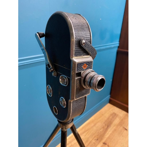 255 - 1950's Agfa camera on tripod stand with original leather case. {120 cm H}.