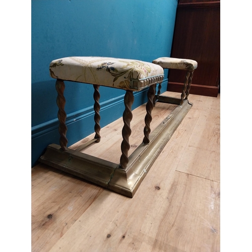 261 - Edwardian brass club fender with upholstered seats. {40 cm H x 130 cm W x 34 cm D}.