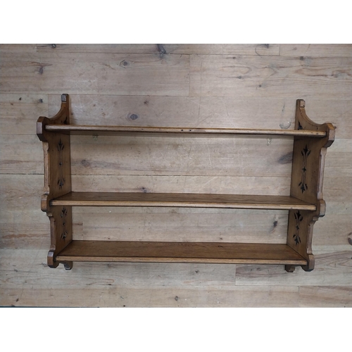 264 - Early 20th C. oak hanging wall shelf. {81 cm H x 107 cm W x 27 cm D}.