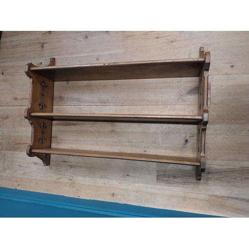 264 - Early 20th C. oak hanging wall shelf. {81 cm H x 107 cm W x 27 cm D}.