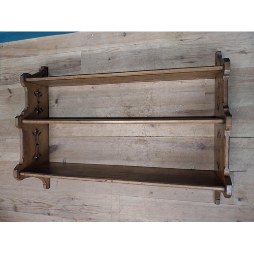 264 - Early 20th C. oak hanging wall shelf. {81 cm H x 107 cm W x 27 cm D}.