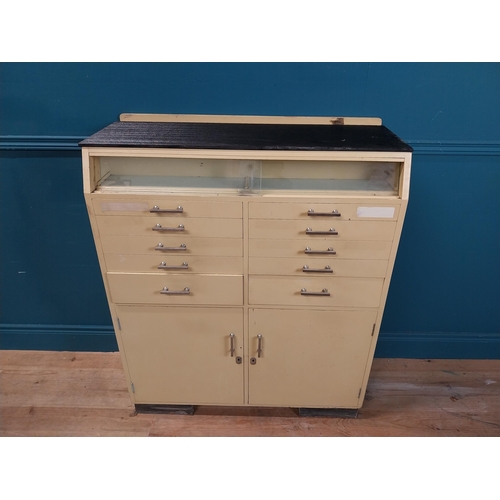 268 - 1950's painted pine Dentist's cabinet with two doors over eight short drawers. {110 cm H x 19 cm W x... 