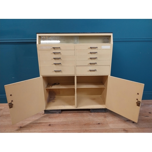 268 - 1950's painted pine Dentist's cabinet with two doors over eight short drawers. {110 cm H x 19 cm W x... 