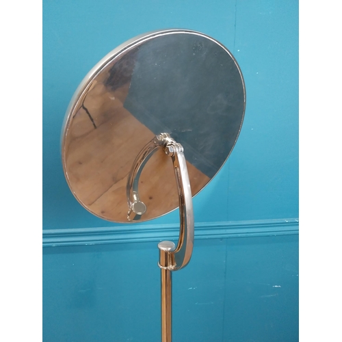 27 - Rare Art Deco chrome shaving mirror on four wheeled stand. {146 cm H x 35 cm x 35 cm D}.