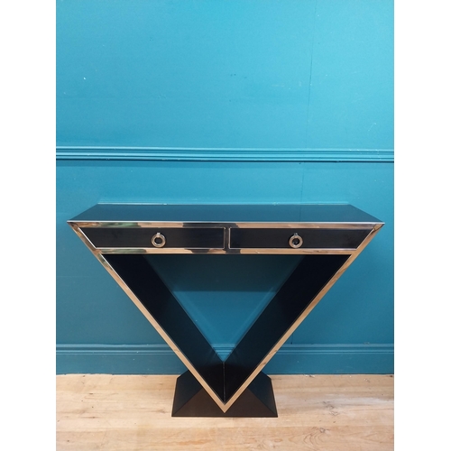 273 - Designer chrome and  ebonised V-shape console table with two drawers in frieze. {80 cm H x 102 cm W ... 