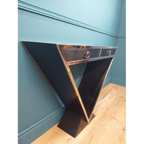 273 - Designer chrome and  ebonised V-shape console table with two drawers in frieze. {80 cm H x 102 cm W ... 