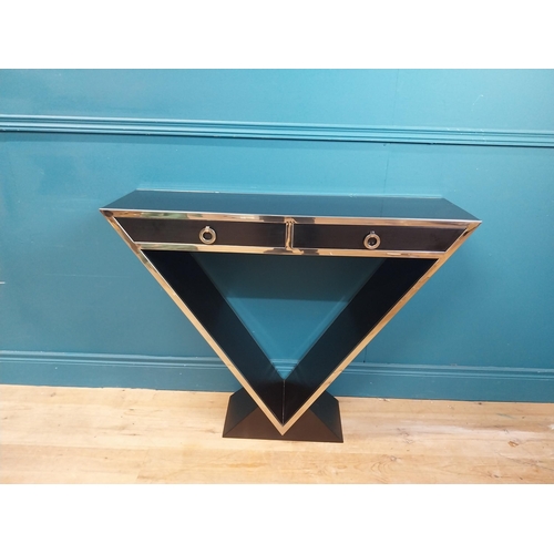 273 - Designer chrome and  ebonised V-shape console table with two drawers in frieze. {80 cm H x 102 cm W ... 