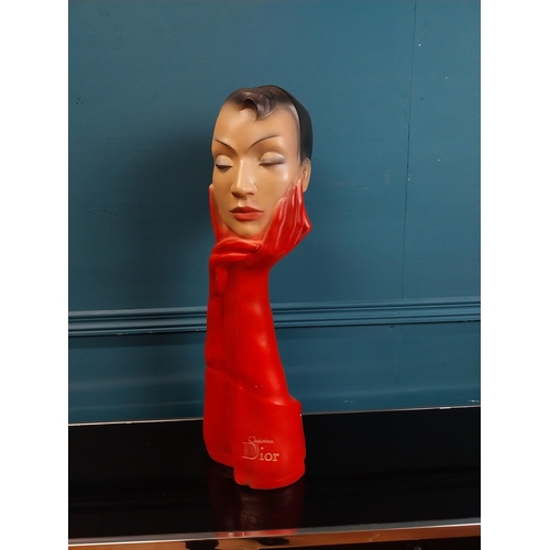 274 - Christian Dior plaster advertising figure with red gloves. {58 cm H x 19 cm W x 14 cm D}.