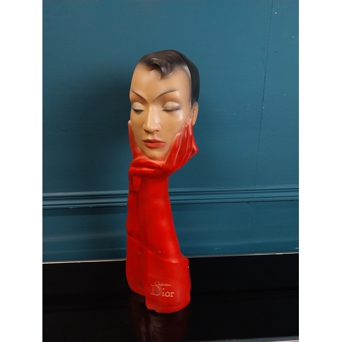 274 - Christian Dior plaster advertising figure with red gloves. {58 cm H x 19 cm W x 14 cm D}.