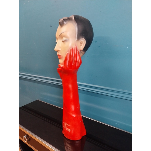 274 - Christian Dior plaster advertising figure with red gloves. {58 cm H x 19 cm W x 14 cm D}.