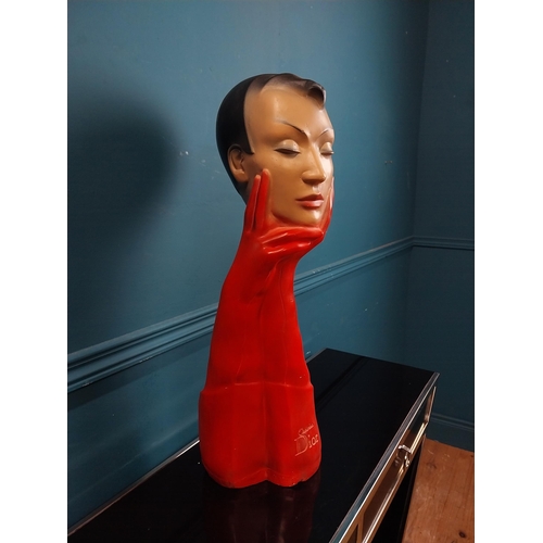 274 - Christian Dior plaster advertising figure with red gloves. {58 cm H x 19 cm W x 14 cm D}.