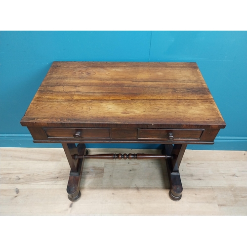 277 - William IV rosewood side table with single turned stretcher. {75 cm H x 70 cm W x 43 cm D}.