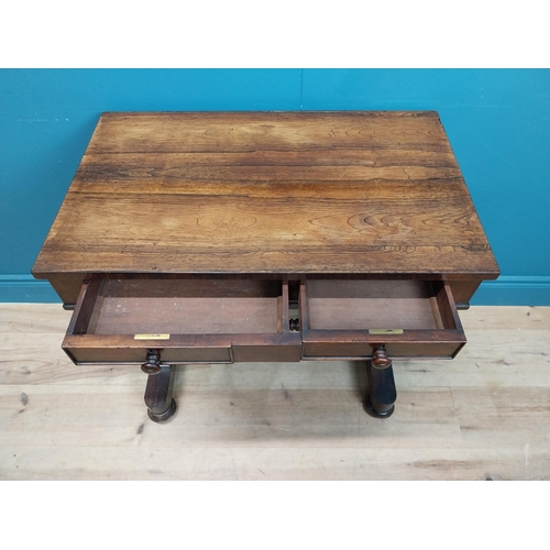 277 - William IV rosewood side table with single turned stretcher. {75 cm H x 70 cm W x 43 cm D}.