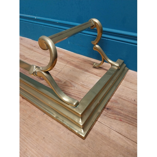 283 - Art Nouveau brass fire fender. {20 cm H x 123 cm W  x 36 cm D}.