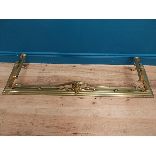 283 - Art Nouveau brass fire fender. {20 cm H x 123 cm W  x 36 cm D}.