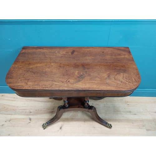 287 - Regency mahogany TOL tea table on four turned columns with outswept feet. {76 cm H x 92 cm W x 46 cm... 