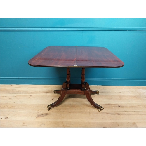 287 - Regency mahogany TOL tea table on four turned columns with outswept feet. {76 cm H x 92 cm W x 46 cm... 