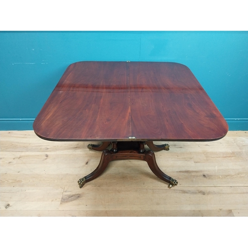 287 - Regency mahogany TOL tea table on four turned columns with outswept feet. {76 cm H x 92 cm W x 46 cm... 