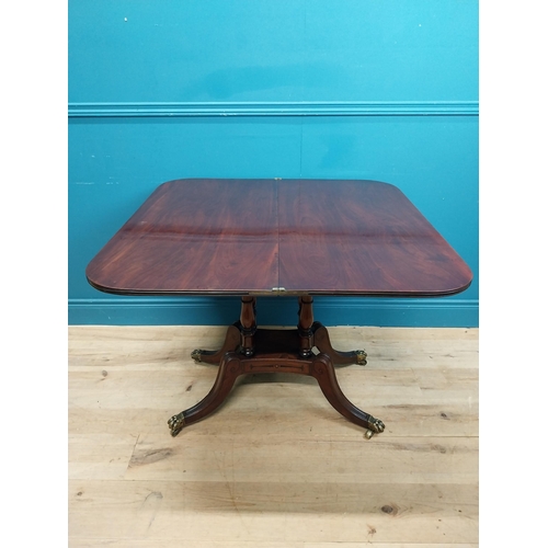 287 - Regency mahogany TOL tea table on four turned columns with outswept feet. {76 cm H x 92 cm W x 46 cm... 