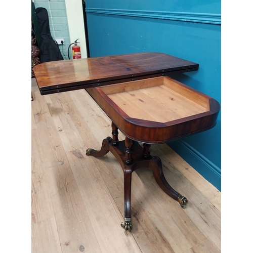 287 - Regency mahogany TOL tea table on four turned columns with outswept feet. {76 cm H x 92 cm W x 46 cm... 