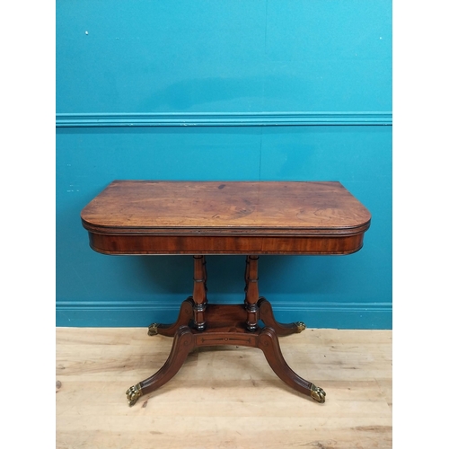 287 - Regency mahogany TOL tea table on four turned columns with outswept feet. {76 cm H x 92 cm W x 46 cm... 