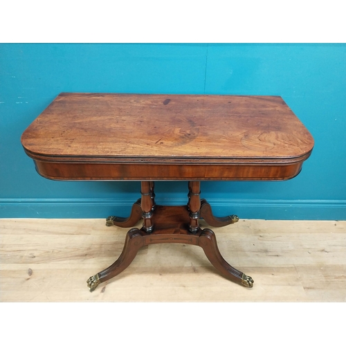 287 - Regency mahogany TOL tea table on four turned columns with outswept feet. {76 cm H x 92 cm W x 46 cm... 