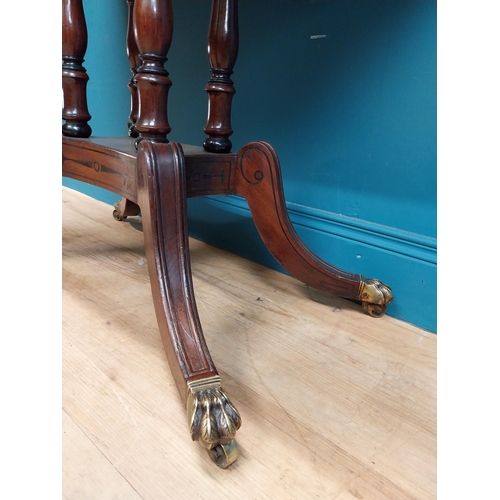 287 - Regency mahogany TOL tea table on four turned columns with outswept feet. {76 cm H x 92 cm W x 46 cm... 