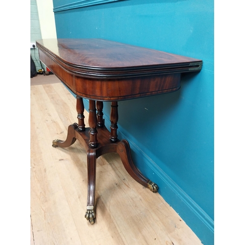 287 - Regency mahogany TOL tea table on four turned columns with outswept feet. {76 cm H x 92 cm W x 46 cm... 