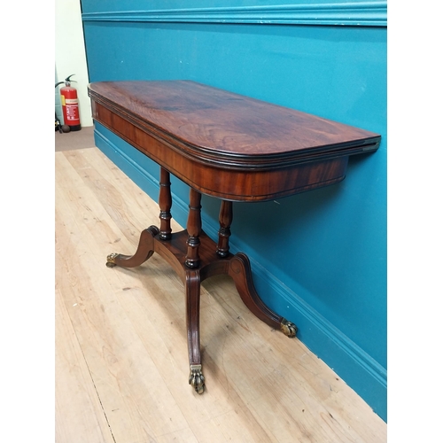 287 - Regency mahogany TOL tea table on four turned columns with outswept feet. {76 cm H x 92 cm W x 46 cm... 