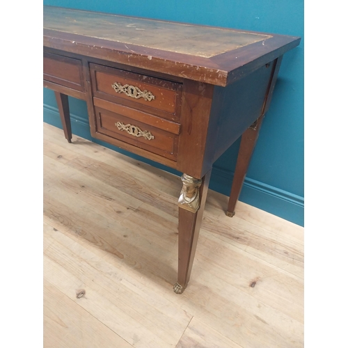 289 - Early 20th C. French mahogany desk with inset tooled leather top with five drawers in frieze in the ... 